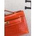 Hermes Orange Kelly Pochette Shiny Niloticus Crocodile Bag