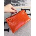 Hermes Orange Kelly Pochette Shiny Niloticus Crocodile Bag