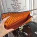 Hermes Medor Clutch Bag In Orange Crocodile Leather