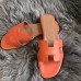 Hermes Oran Sandals In Orange Swift Leather