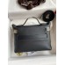 Hermes 24/24 Mini 21 Handmade Bag in Black Evercolor Leather