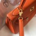 Hermes Orange Clemence Kelly 25cm GHW Bag